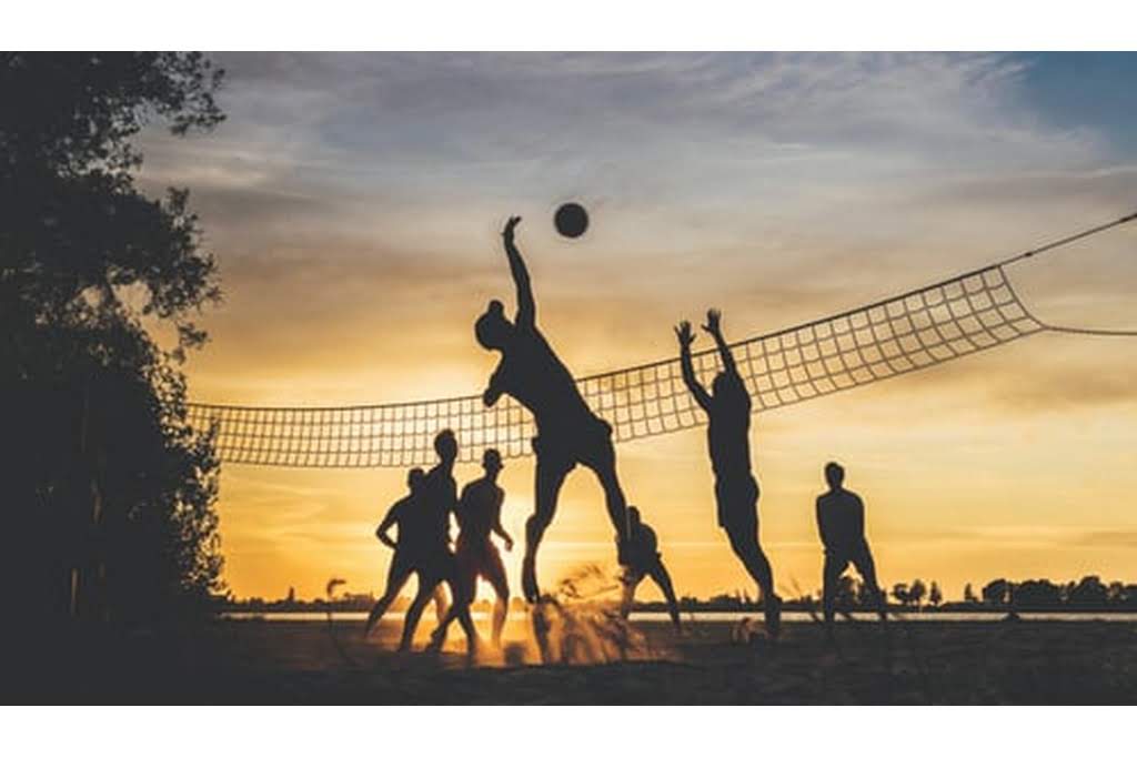 kids playing beach volleyball