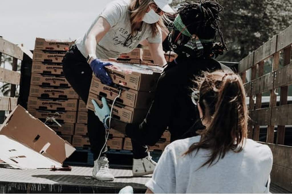 people unloading truck