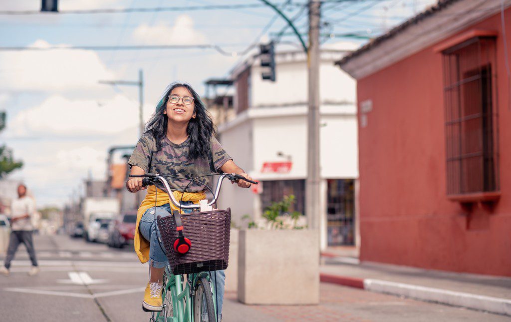 young woman riding bike