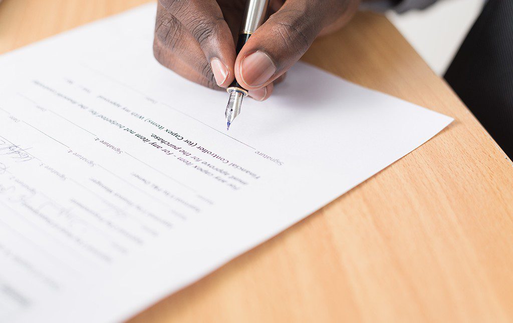 person signing contract