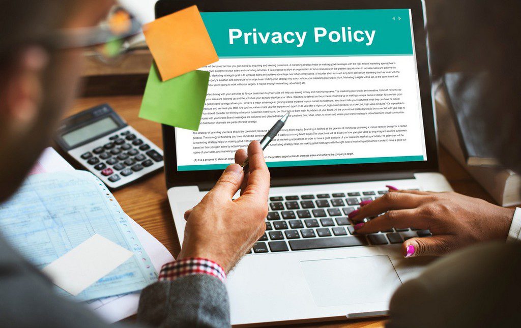 PTA members looking at privacy policy to symbolize compliance