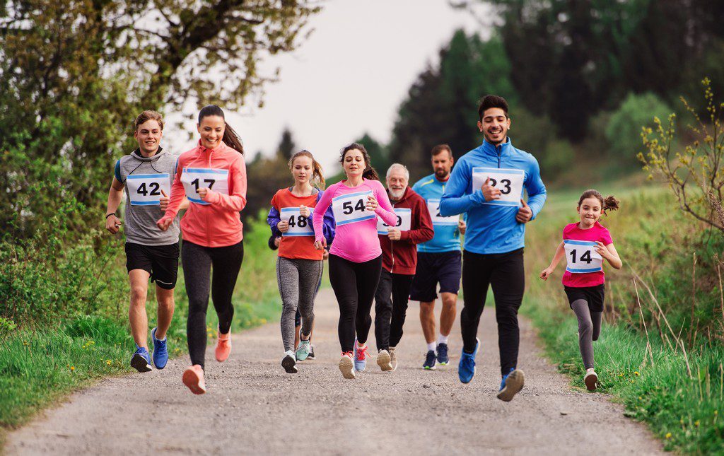 Group of people running in a 5k race event