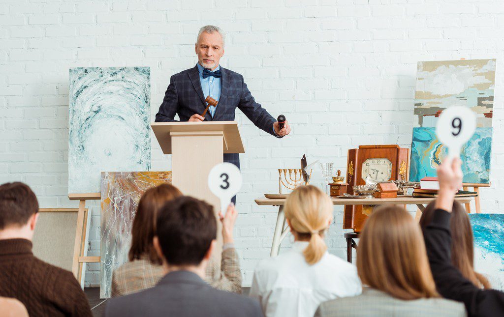 Man running an auction