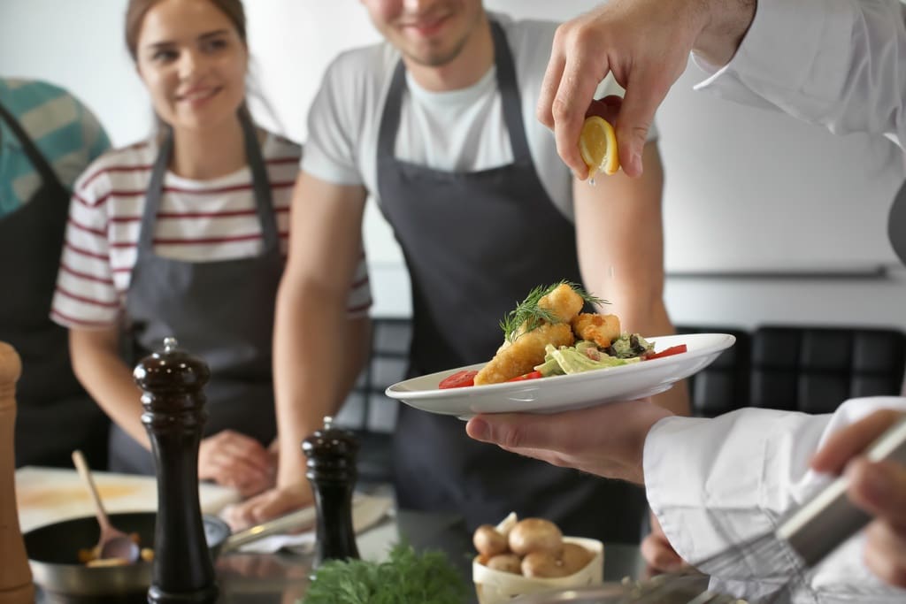 High school students in cooking class funded by donation campaign