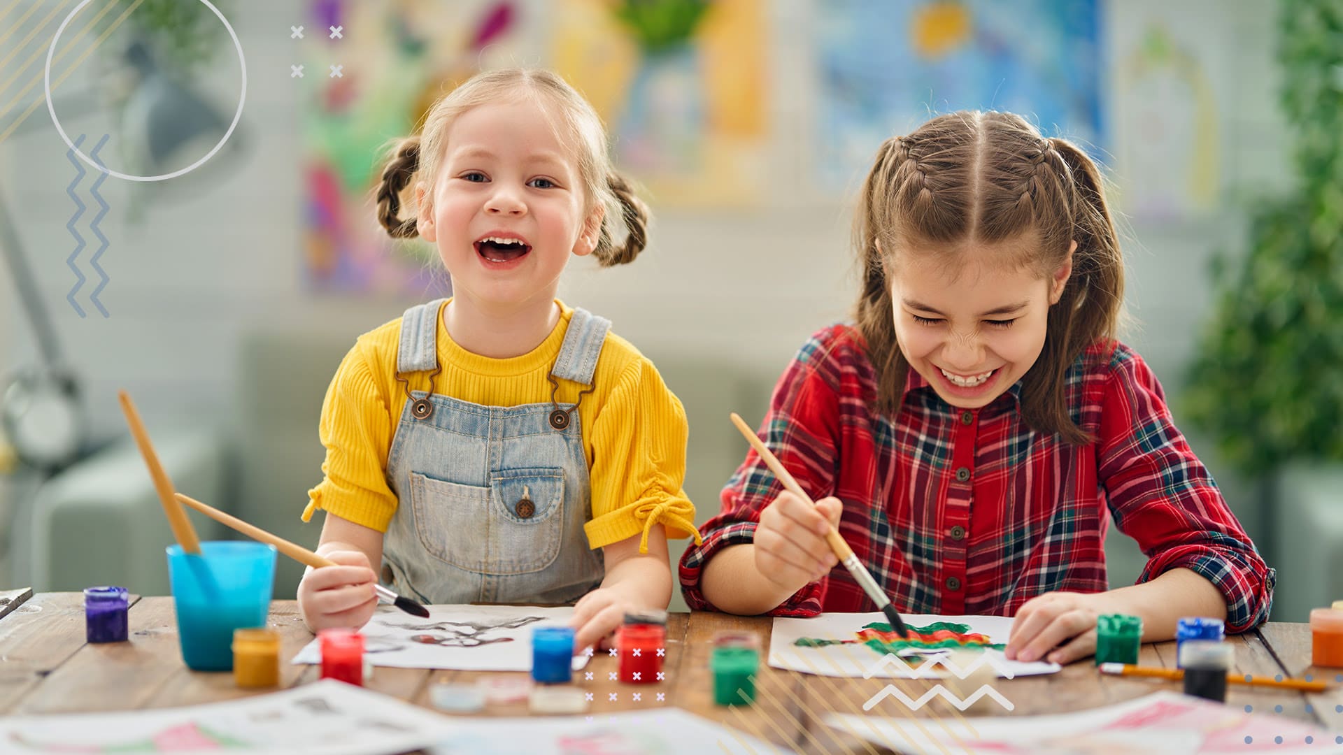 Two young students participating in a school art fundraiser