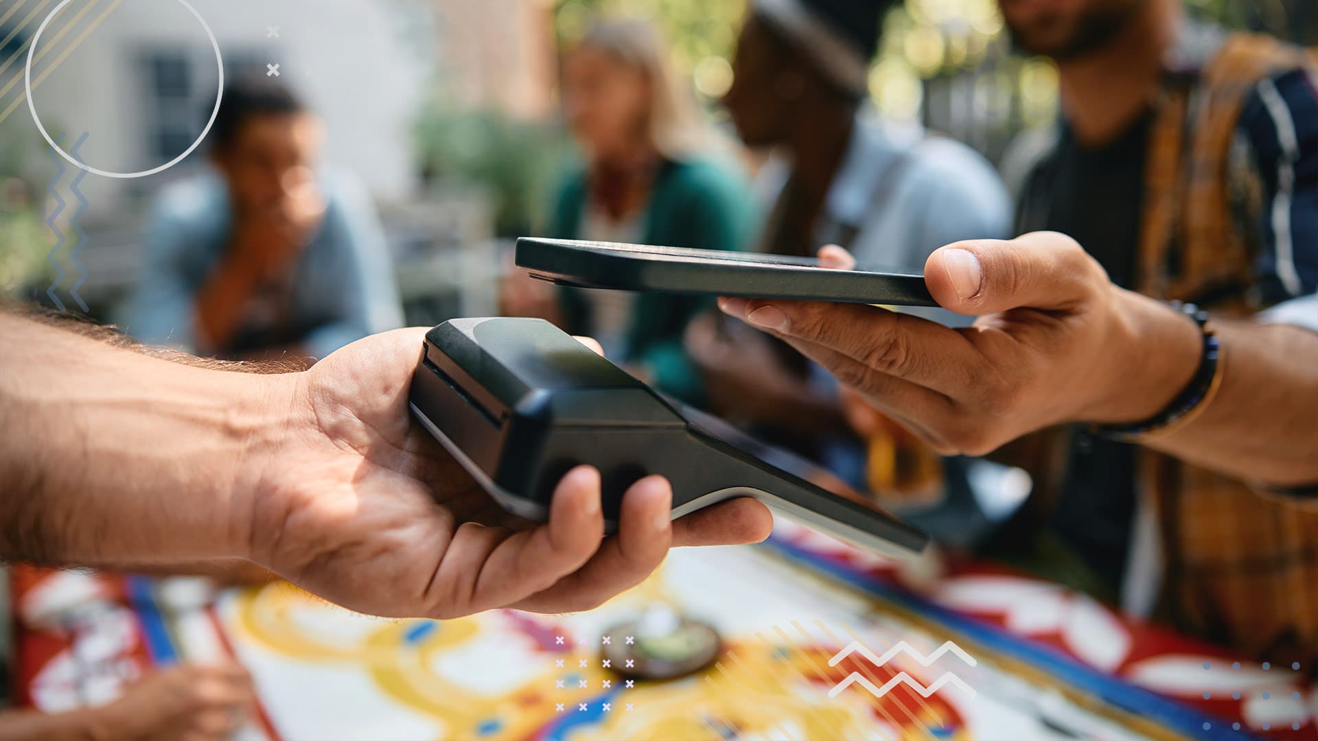 Person paying at cashier using Apple pay on smart phone