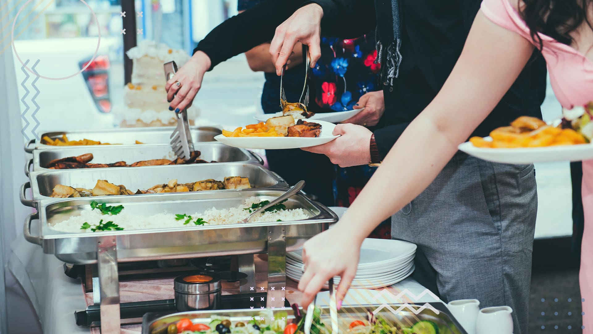 Students and staff eating at a buffet