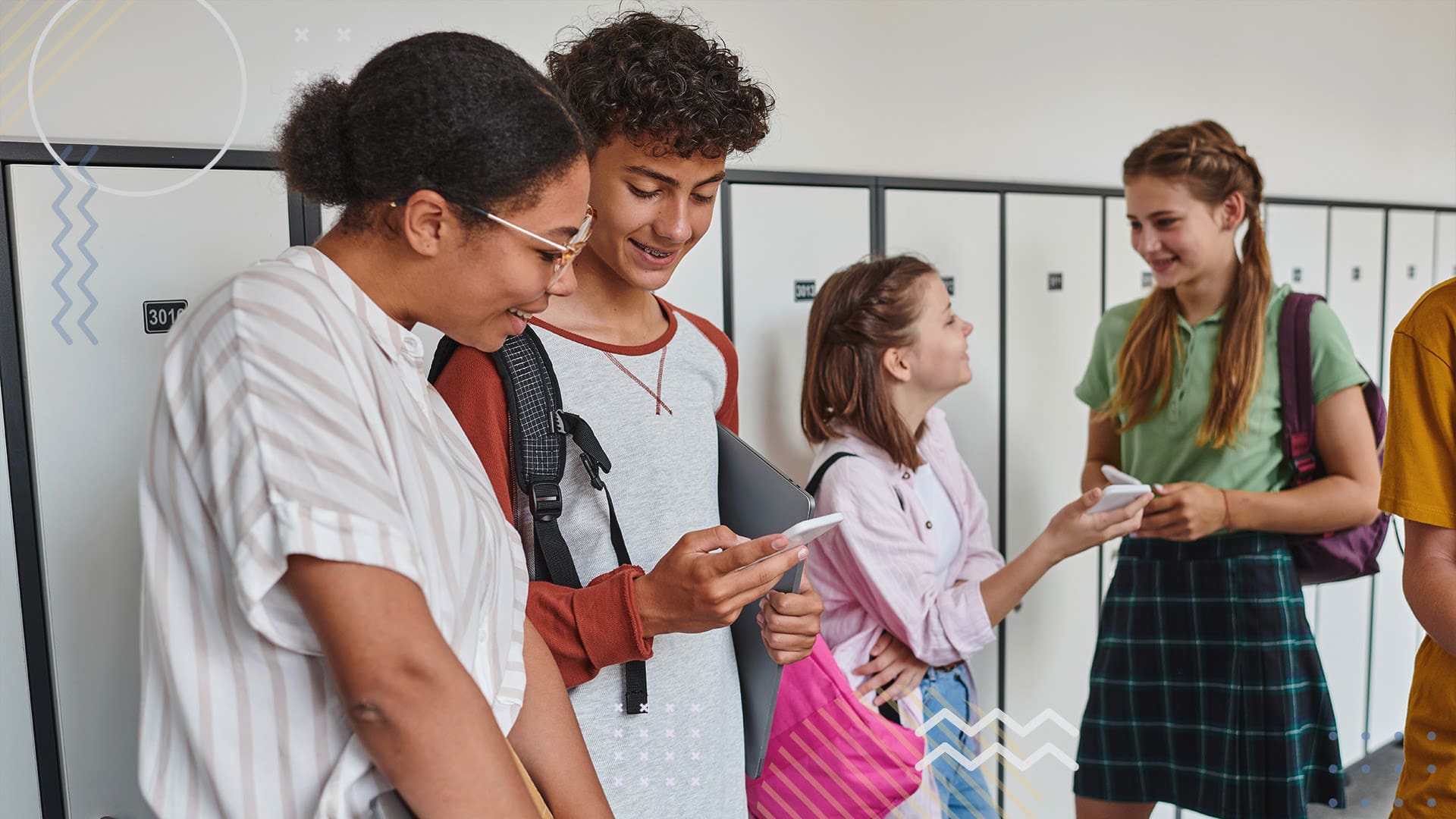 Students looking at event tickets on smart phone