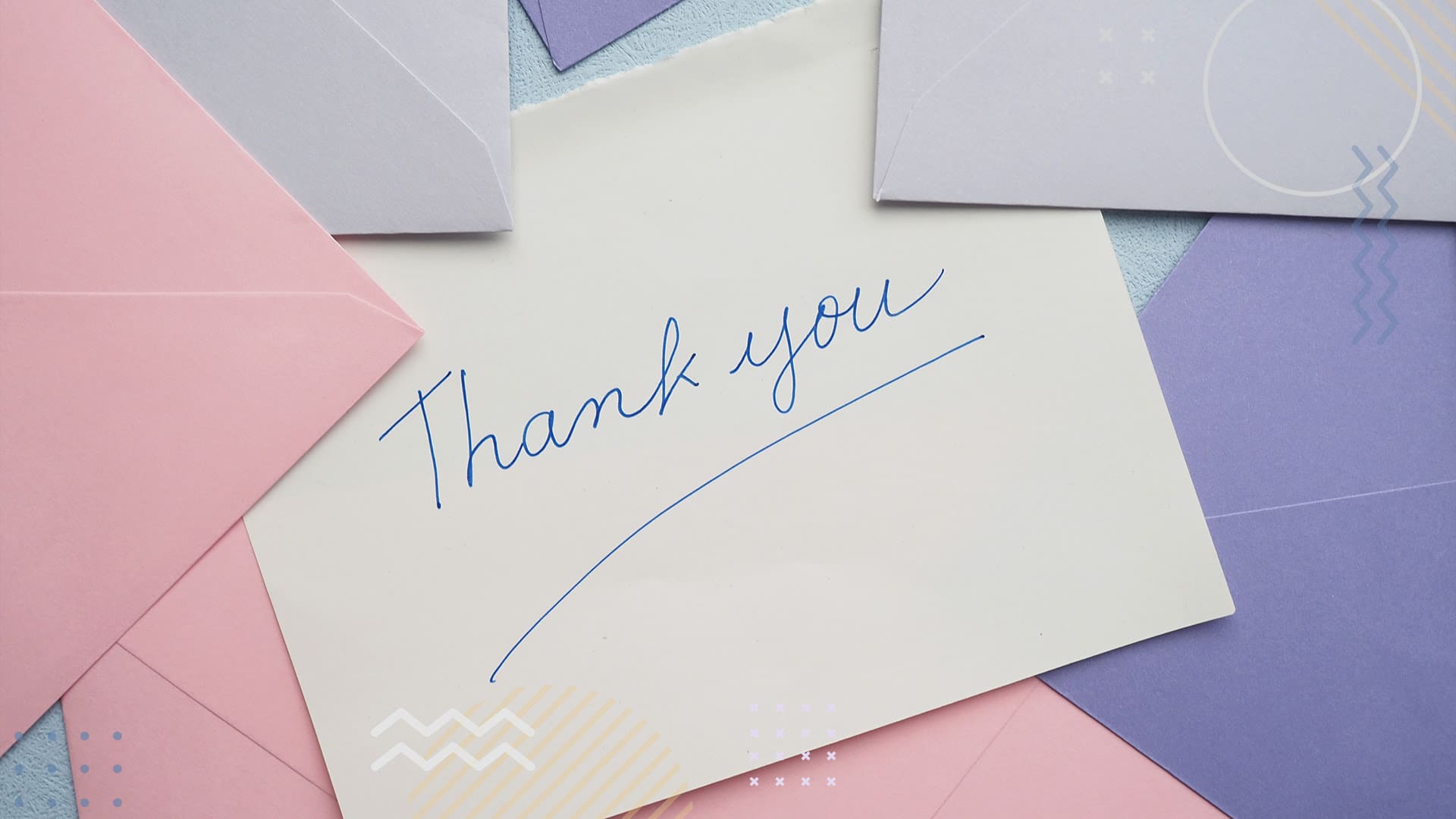 White envelope with Thank You written on it